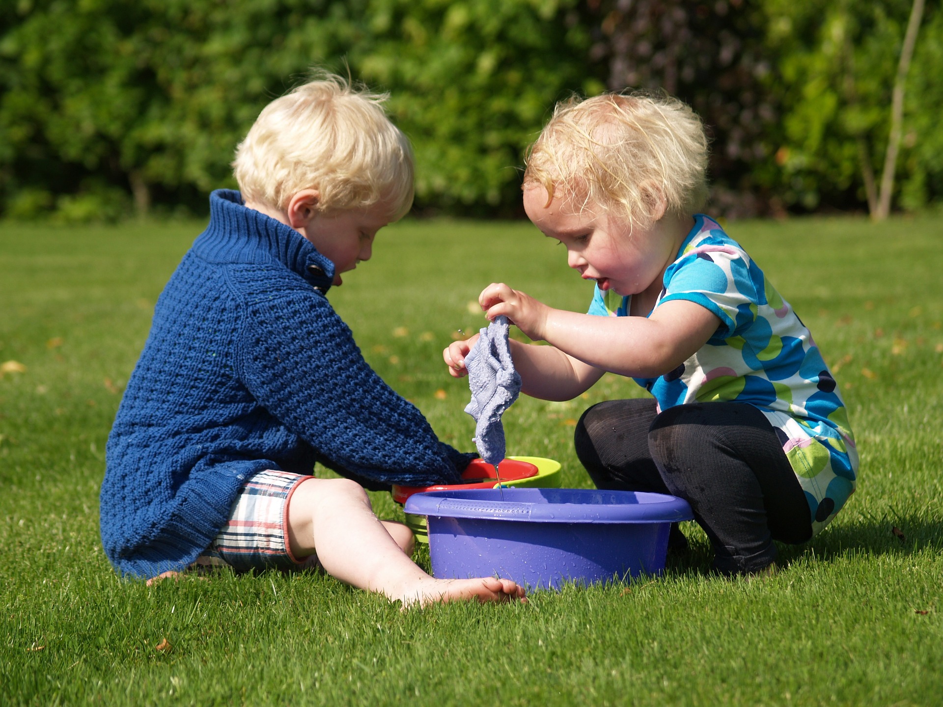 Children sharing water play