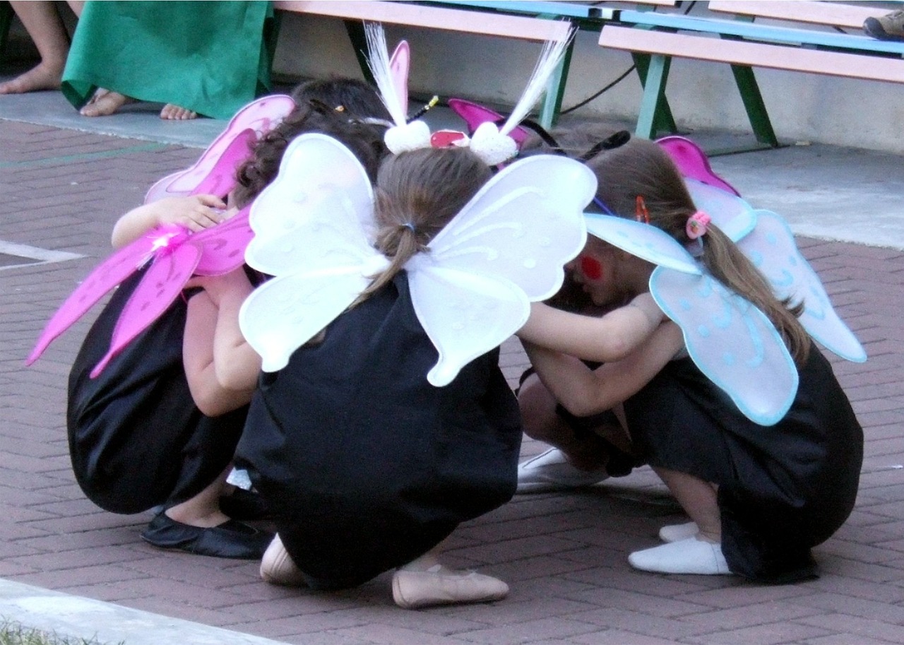 Children role-playing in a group