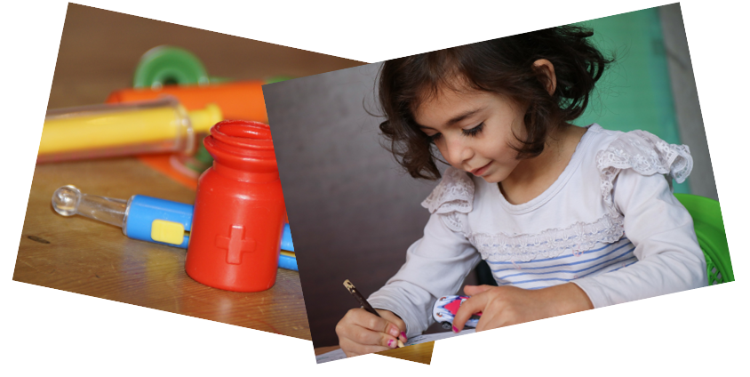 Child writing and medical related toys