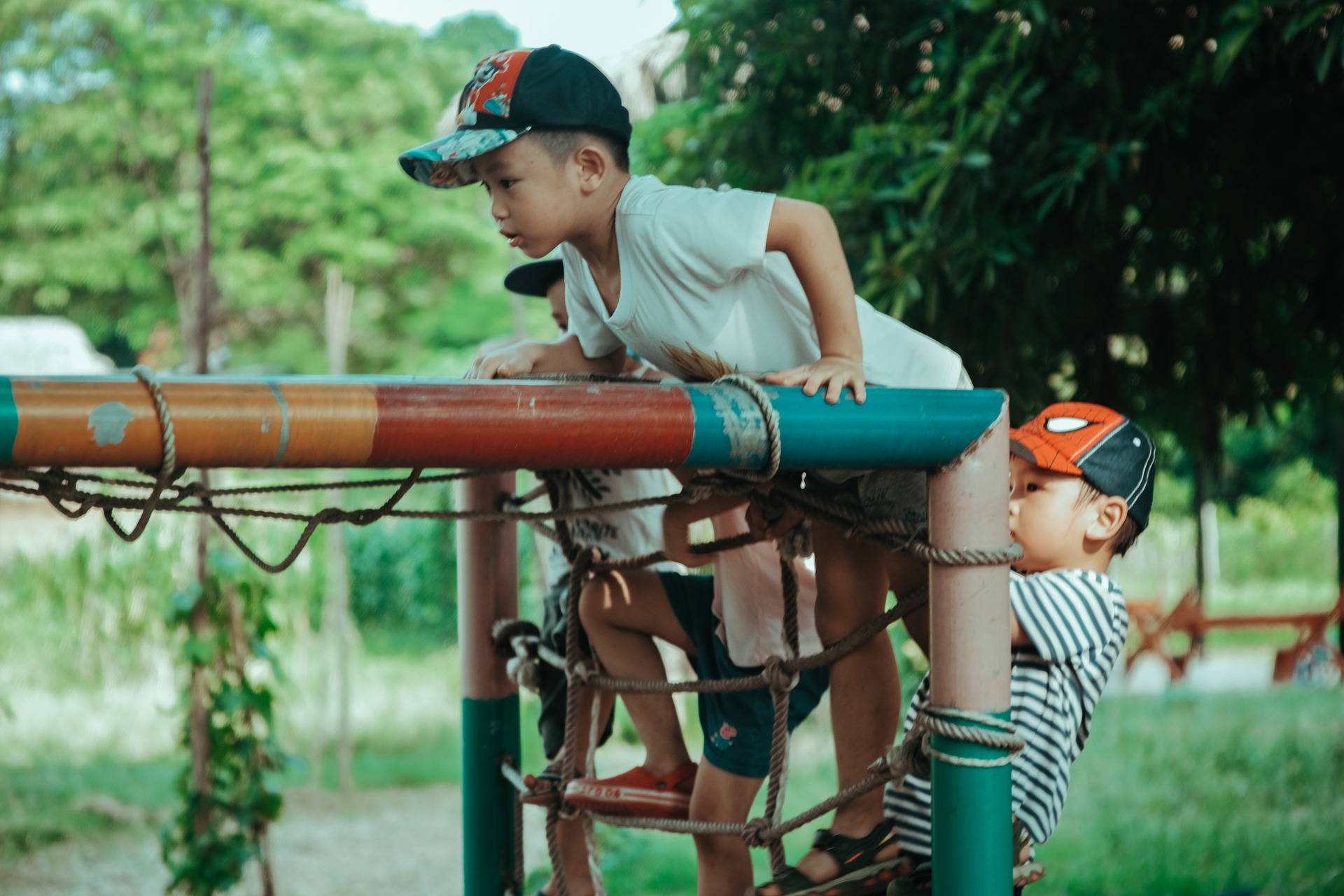 Child using climbing frame