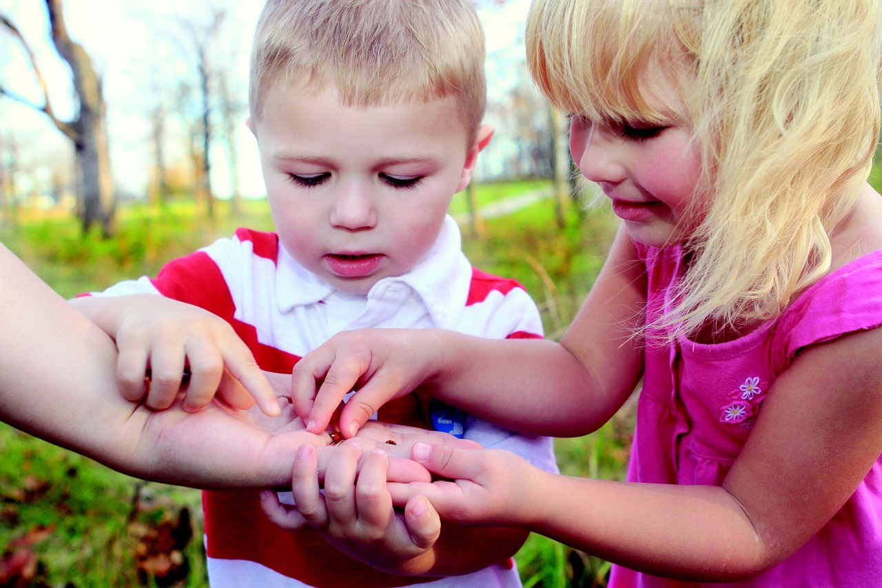 Two children exploring nature together