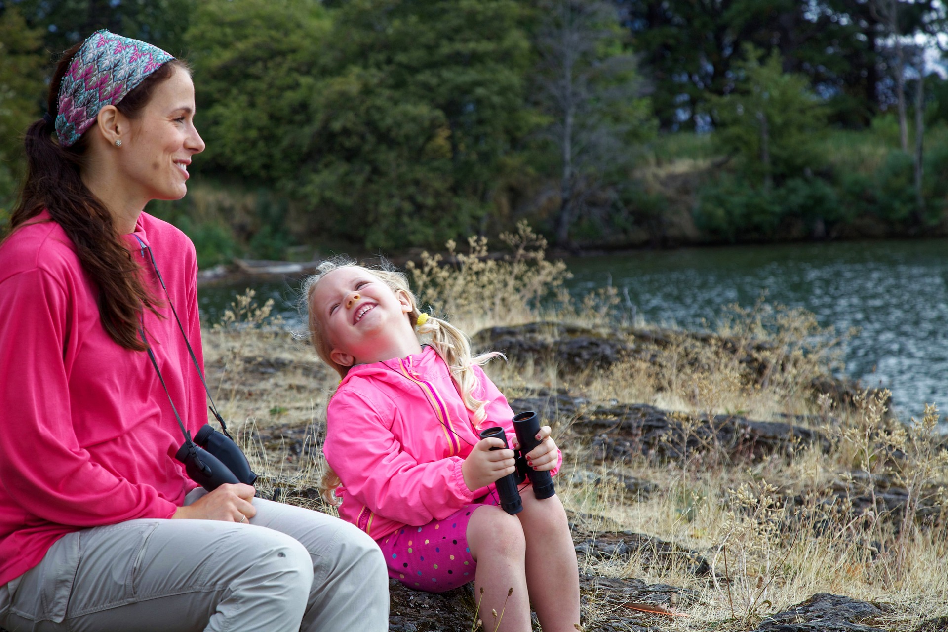 Adult and child viewing nature